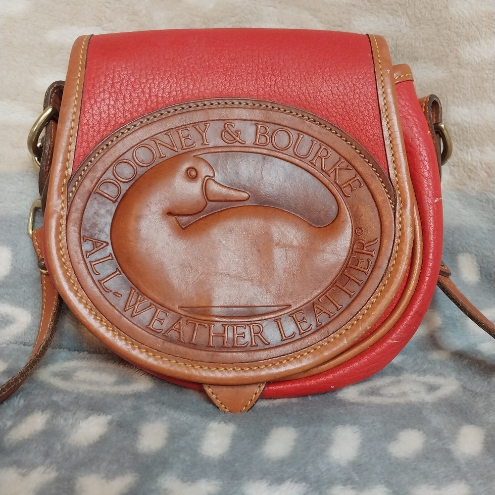 Vintage Dooney & Bourke Red Crossbody Bag with Circular Embossed Design
